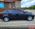 Чорний Кіа Ріо, об'ємом двигуна 14 л та пробігом 96 тис. км за 8600 $, фото 3 на Automoto.ua