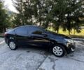 Черный Киа Рио, объемом двигателя 1.4 л и пробегом 179 тыс. км за 7998 $, фото 2 на Automoto.ua