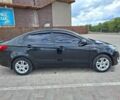 Чорний Кіа Ріо, об'ємом двигуна 1.4 л та пробігом 96 тис. км за 8200 $, фото 1 на Automoto.ua