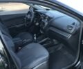 Чорний Кіа Ріо, об'ємом двигуна 1.4 л та пробігом 92 тис. км за 10000 $, фото 5 на Automoto.ua