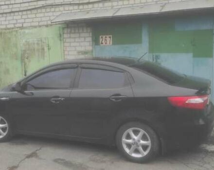 Черный Киа Рио, объемом двигателя 1.4 л и пробегом 120 тыс. км за 8500 $, фото 6 на Automoto.ua