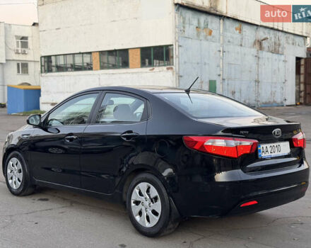 Черный Киа Рио, объемом двигателя 1.4 л и пробегом 305 тыс. км за 4950 $, фото 8 на Automoto.ua