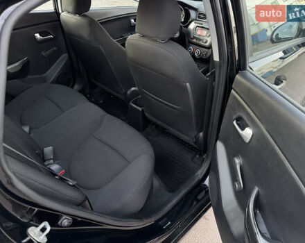 Черный Киа Рио, объемом двигателя 1.4 л и пробегом 305 тыс. км за 4950 $, фото 14 на Automoto.ua