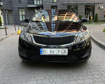 Черный Киа Рио, объемом двигателя 1.4 л и пробегом 136 тыс. км за 8100 $, фото 2 на Automoto.ua