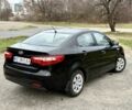 Чорний Кіа Ріо, об'ємом двигуна 1.4 л та пробігом 45 тис. км за 9800 $, фото 5 на Automoto.ua