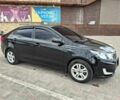 Чорний Кіа Ріо, об'ємом двигуна 1.4 л та пробігом 96 тис. км за 8000 $, фото 1 на Automoto.ua