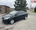 Черный Киа Рио, объемом двигателя 1.4 л и пробегом 136 тыс. км за 7700 $, фото 4 на Automoto.ua