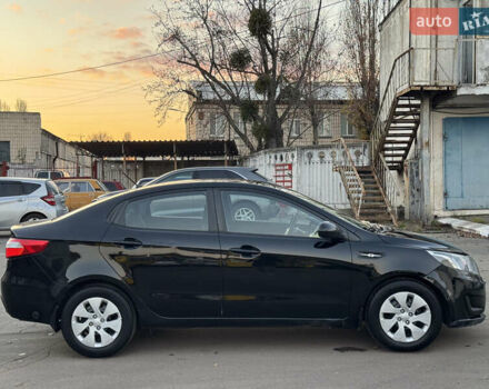 Черный Киа Рио, объемом двигателя 1.4 л и пробегом 305 тыс. км за 4950 $, фото 4 на Automoto.ua