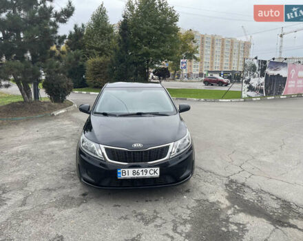 Черный Киа Рио, объемом двигателя 1.4 л и пробегом 136 тыс. км за 7700 $, фото 3 на Automoto.ua