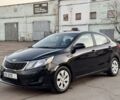 Черный Киа Рио, объемом двигателя 1.4 л и пробегом 305 тыс. км за 4750 $, фото 1 на Automoto.ua