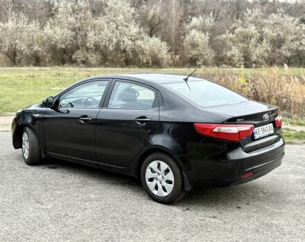 Чорний Кіа Ріо, об'ємом двигуна 1.4 л та пробігом 45 тис. км за 9800 $, фото 7 на Automoto.ua