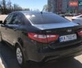 Чорний Кіа Ріо, об'ємом двигуна 1.4 л та пробігом 177 тис. км за 6800 $, фото 3 на Automoto.ua