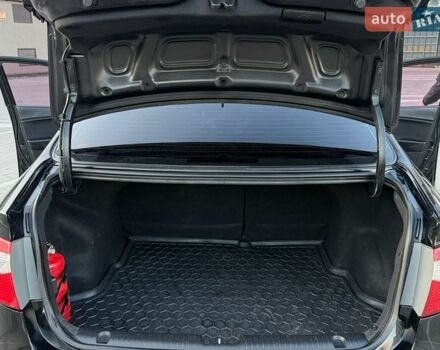 Черный Киа Рио, объемом двигателя 1.4 л и пробегом 90 тыс. км за 9000 $, фото 7 на Automoto.ua