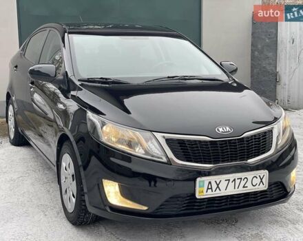 Черный Киа Рио, объемом двигателя 1.4 л и пробегом 124 тыс. км за 9350 $, фото 4 на Automoto.ua