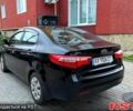 Чорний Кіа Ріо, об'ємом двигуна 1.4 л та пробігом 87 тис. км за 7700 $, фото 3 на Automoto.ua