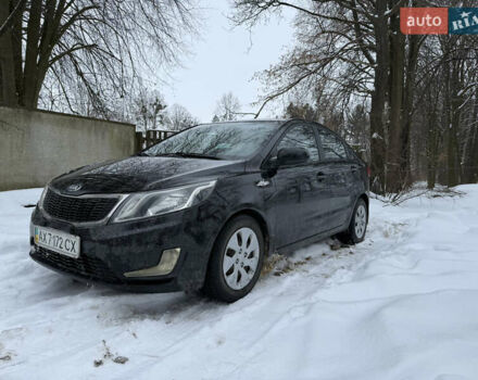 Чорний Кіа Ріо, об'ємом двигуна 1.4 л та пробігом 123 тис. км за 7300 $, фото 1 на Automoto.ua