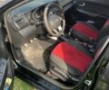 Черный Киа Рио, объемом двигателя 1.4 л и пробегом 212 тыс. км за 7700 $, фото 6 на Automoto.ua