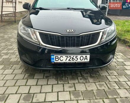 Чорний Кіа Ріо, об'ємом двигуна 1.4 л та пробігом 141 тис. км за 7200 $, фото 5 на Automoto.ua
