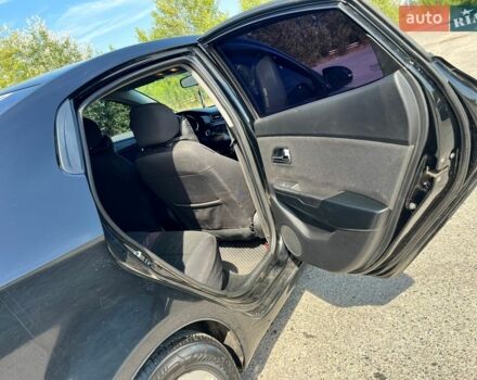 Чорний Кіа Ріо, об'ємом двигуна 1.6 л та пробігом 142 тис. км за 6800 $, фото 8 на Automoto.ua