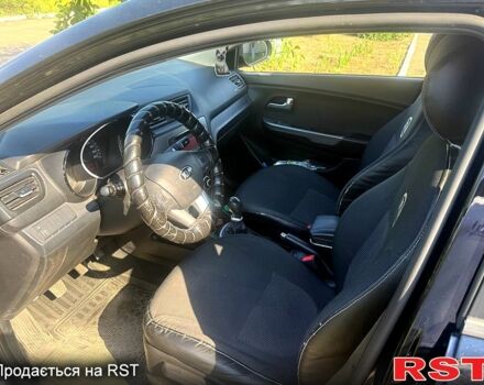 Черный Киа Рио, объемом двигателя 1.4 л и пробегом 109 тыс. км за 8100 $, фото 2 на Automoto.ua