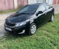 Черный Киа Рио, объемом двигателя 1.4 л и пробегом 212 тыс. км за 7800 $, фото 1 на Automoto.ua