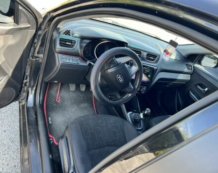 Черный Киа Рио, объемом двигателя 1.6 л и пробегом 142 тыс. км за 6412 $, фото 1 на Automoto.ua