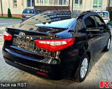 Киа Рио 2013 в Ромнах на Automoto.ua Черный Киа Рио, объемом двигателя 1.6 л и пробегом 130 тыс. км за 8750 $, фото 2 на Automoto.ua