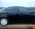 Чорний Кіа Ріо, об'ємом двигуна 1.6 л та пробігом 91 тис. км за 7800 $, фото 1 на Automoto.ua