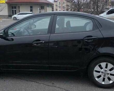 Черный Киа Рио, объемом двигателя 1.59 л и пробегом 150 тыс. км за 9000 $, фото 1 на Automoto.ua