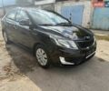Черный Киа Рио, объемом двигателя 1.6 л и пробегом 61 тыс. км за 10300 $, фото 2 на Automoto.ua