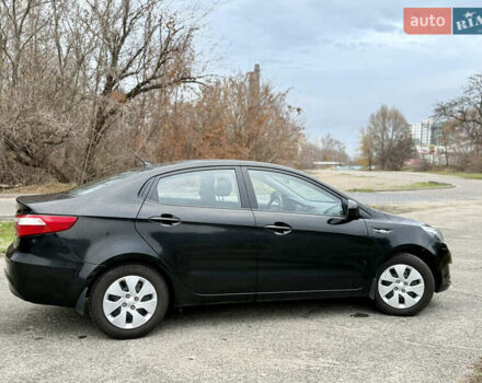 Чорний Кіа Ріо, об'ємом двигуна 1.4 л та пробігом 45 тис. км за 9800 $, фото 5 на Automoto.ua