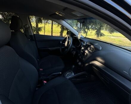 Черный Киа Рио, объемом двигателя 1.4 л и пробегом 179 тыс. км за 7998 $, фото 9 на Automoto.ua