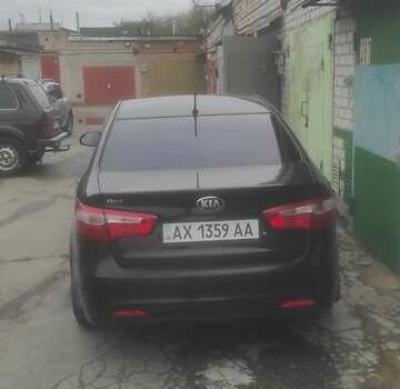 Черный Киа Рио, объемом двигателя 1.4 л и пробегом 120 тыс. км за 8500 $, фото 7 на Automoto.ua