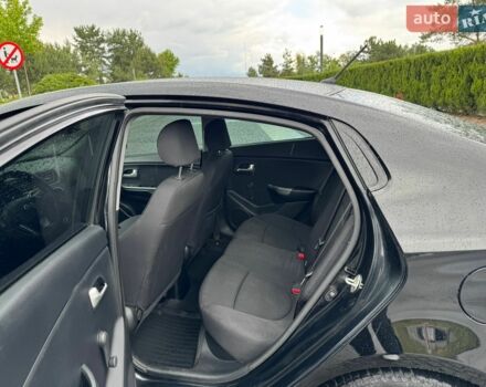 Чорний Кіа Ріо, об'ємом двигуна 1.4 л та пробігом 107 тис. км за 7500 $, фото 8 на Automoto.ua