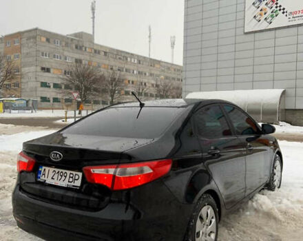 Черный Киа Рио, объемом двигателя 1.6 л и пробегом 270 тыс. км за 5850 $, фото 4 на Automoto.ua