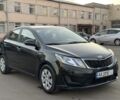 Черный Киа Рио, объемом двигателя 1.4 л и пробегом 305 тыс. км за 4750 $, фото 2 на Automoto.ua