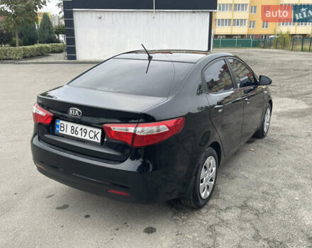 Черный Киа Рио, объемом двигателя 1.4 л и пробегом 136 тыс. км за 7700 $, фото 7 на Automoto.ua