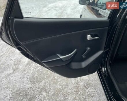 Черный Киа Рио, объемом двигателя 1.4 л и пробегом 124 тыс. км за 9350 $, фото 126 на Automoto.ua