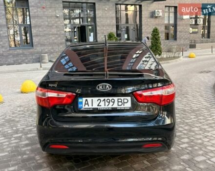 Чорний Кіа Ріо, об'ємом двигуна 1.6 л та пробігом 272 тис. км за 5950 $, фото 7 на Automoto.ua
