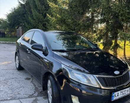 Чорний Кіа Ріо, об'ємом двигуна 1.4 л та пробігом 179 тис. км за 8000 $, фото 1 на Automoto.ua