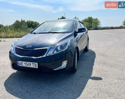 Чорний Кіа Ріо, об'ємом двигуна 1.6 л та пробігом 142 тис. км за 6800 $, фото 1 на Automoto.ua