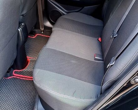 Киа Рио 2013 в Ромнах на Automoto.ua Черный Киа Рио, объемом двигателя 1.6 л и пробегом 130 тыс. км за 8750 $, фото 8 на Automoto.ua