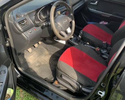 Черный Киа Рио, объемом двигателя 1.4 л и пробегом 212 тыс. км за 7800 $, фото 6 на Automoto.ua
