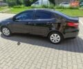 Чорний Кіа Ріо, об'ємом двигуна 1.4 л та пробігом 186 тис. км за 6800 $, фото 2 на Automoto.ua
