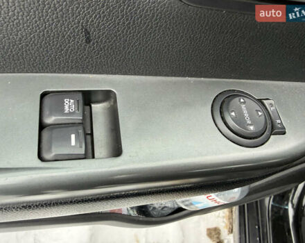 Чорний Кіа Ріо, об'ємом двигуна 1.4 л та пробігом 123 тис. км за 7300 $, фото 19 на Automoto.ua