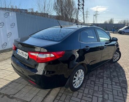 Чорний Кіа Ріо, об'ємом двигуна 1.4 л та пробігом 213 тис. км за 7200 $, фото 2 на Automoto.ua