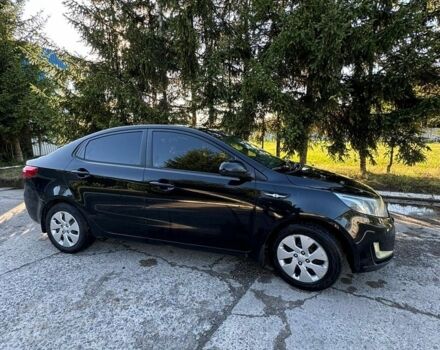 Чорний Кіа Ріо, об'ємом двигуна 1.4 л та пробігом 179 тис. км за 8000 $, фото 8 на Automoto.ua