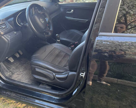 Черный Киа Рио, объемом двигателя 1.4 л и пробегом 150 тыс. км за 7800 $, фото 4 на Automoto.ua