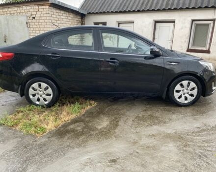 Чорний Кіа Ріо, об'ємом двигуна 1.4 л та пробігом 88 тис. км за 8300 $, фото 3 на Automoto.ua