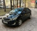 Чорний Кіа Ріо, об'ємом двигуна 1.6 л та пробігом 272 тис. км за 5950 $, фото 1 на Automoto.ua